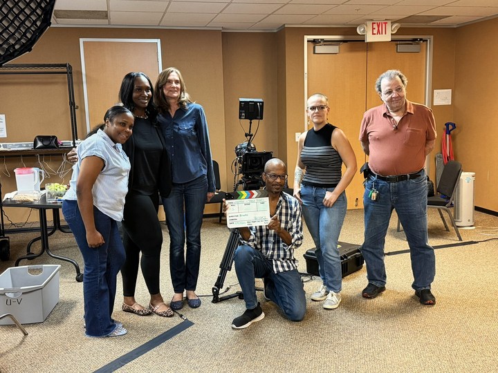 Table-read participants gathered in the recording space