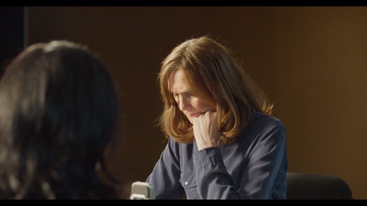 Closer view of a participant looking down during the Studio 1 table read